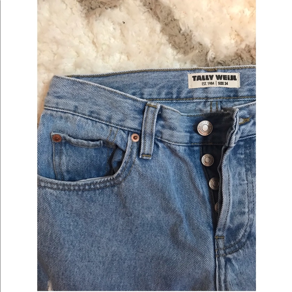 Ripped light wash denim jeans